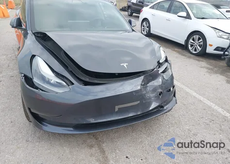 2022 Tesla Model 3 Long Range Dual Motor All-Wheel Drive z USA, uszkodzony, nr VIN 5YJ3E1EB4NF208390